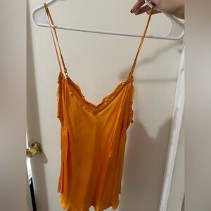 Bright orange aritzia silk tank top